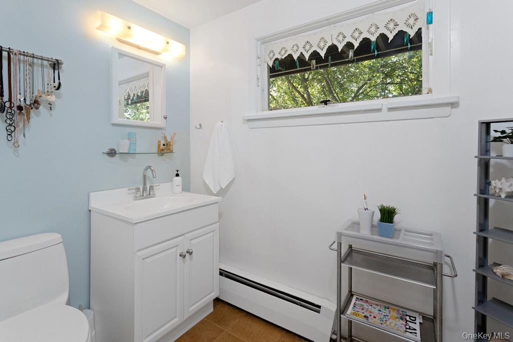 2 Buttermilk Falls Road Nyack, NY 10960 - Photo 25 of 41 a bathroom with a sink and a toilet