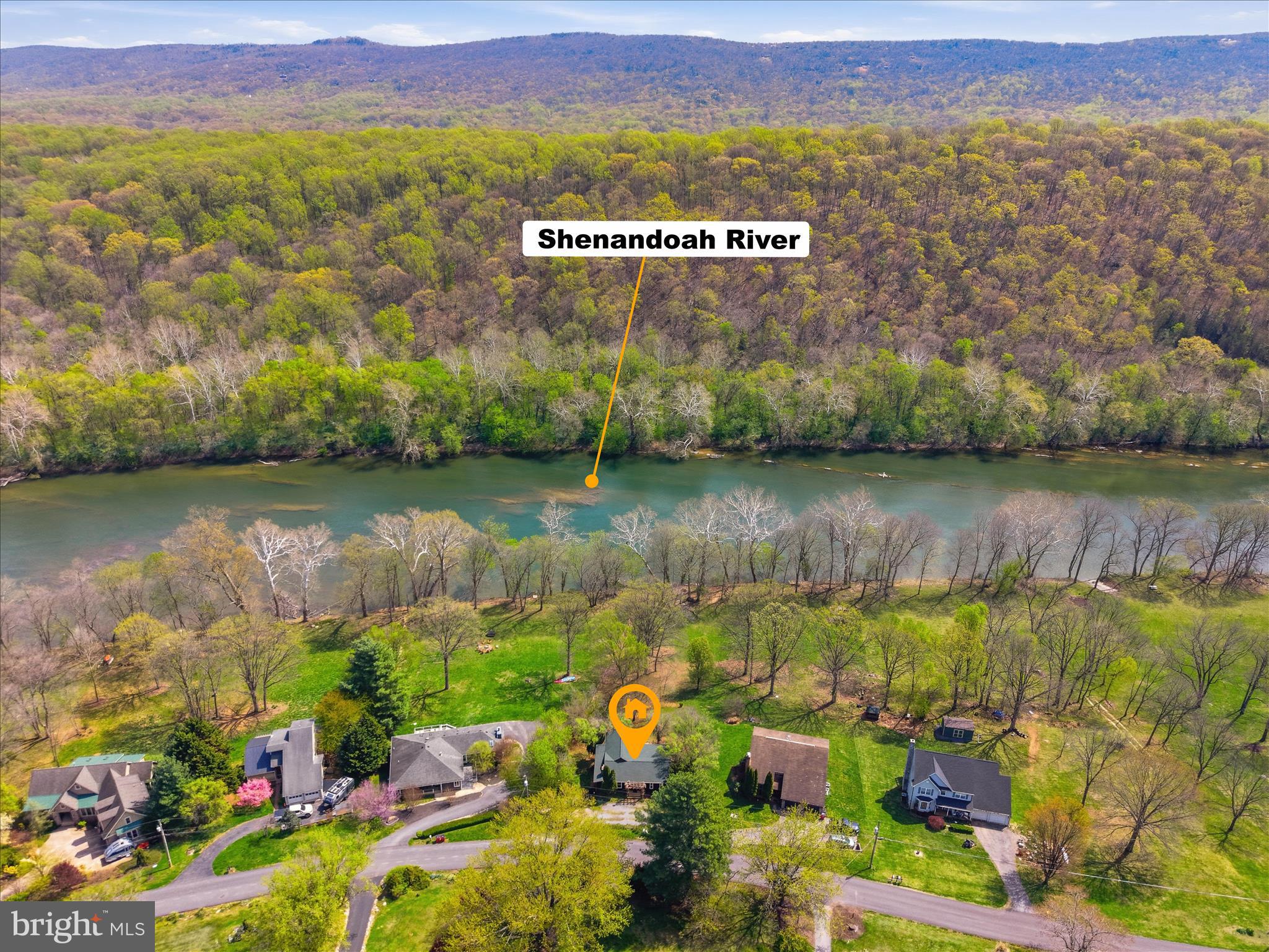a view of a lake with a mountain in the background