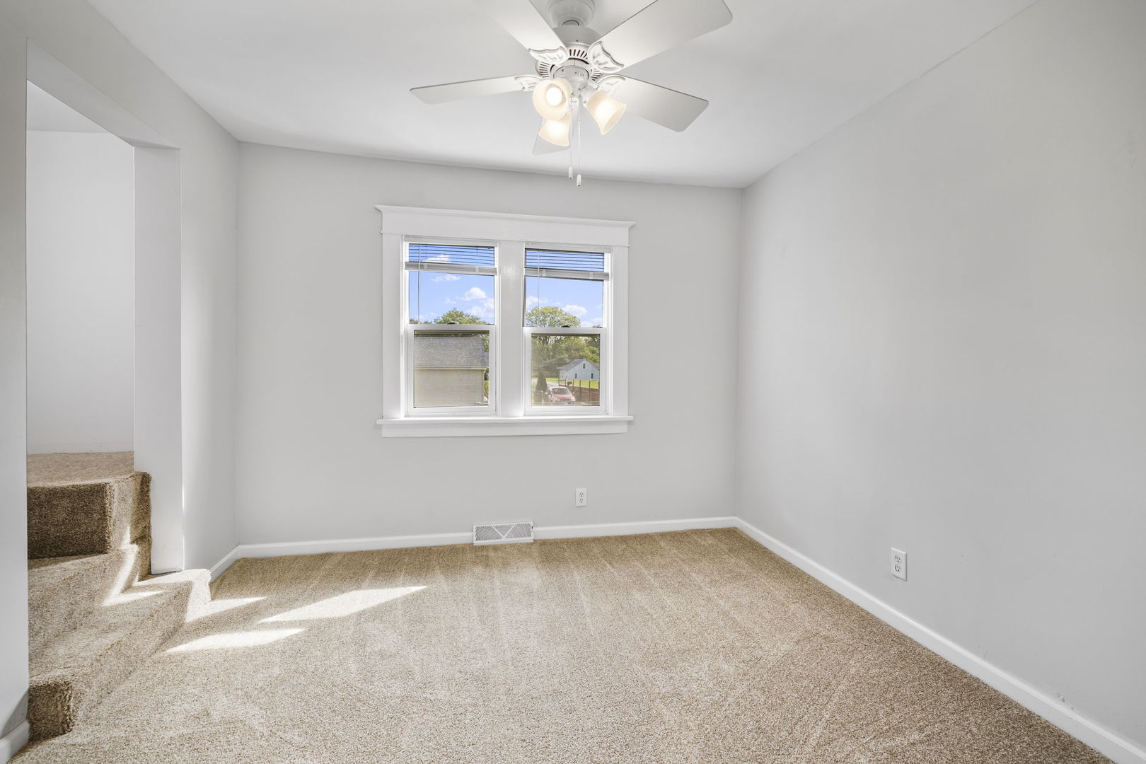 303 Princeton Street Lockport, IL 60441 - Photo 10 of 16 a view of an empty room with a window