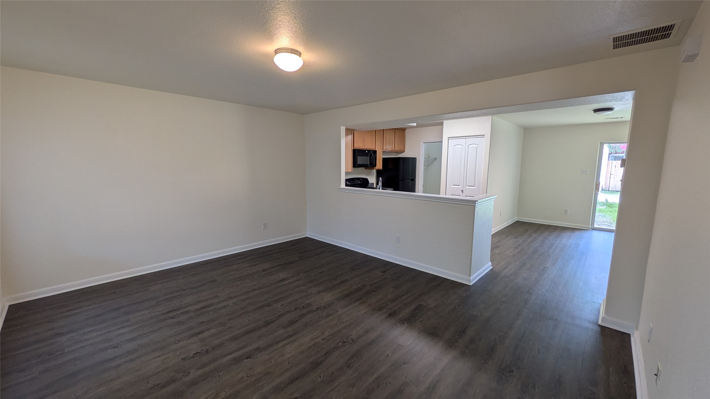 262 Trestle Tree San Marcos, TX 78666 - Photo 4 of 18 a view of empty room with wooden floor