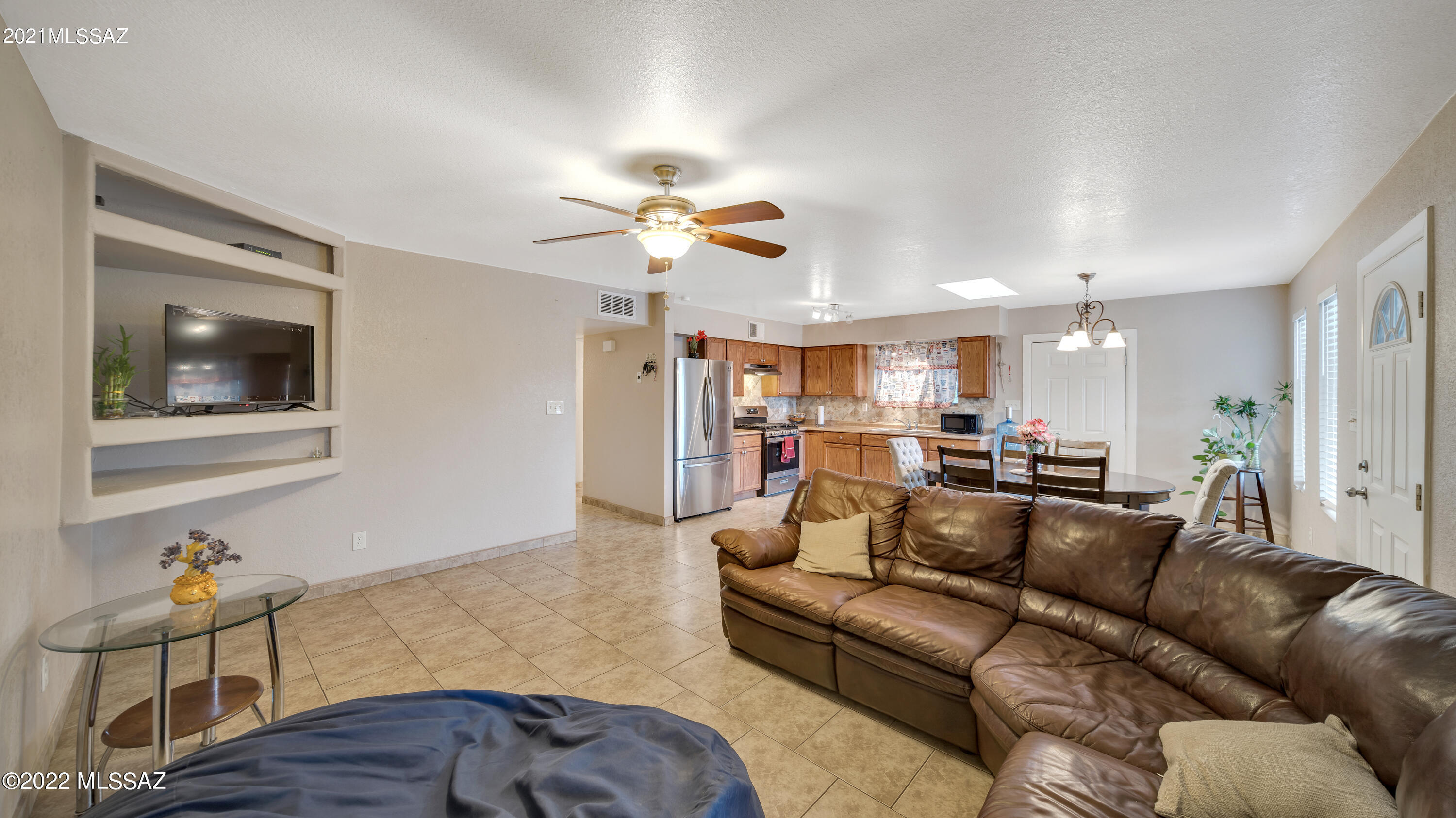 434 Paseo Flamenco Rio Rico, AZ 85648 - Photo 1 of 27 a living room with furniture and kitchen view