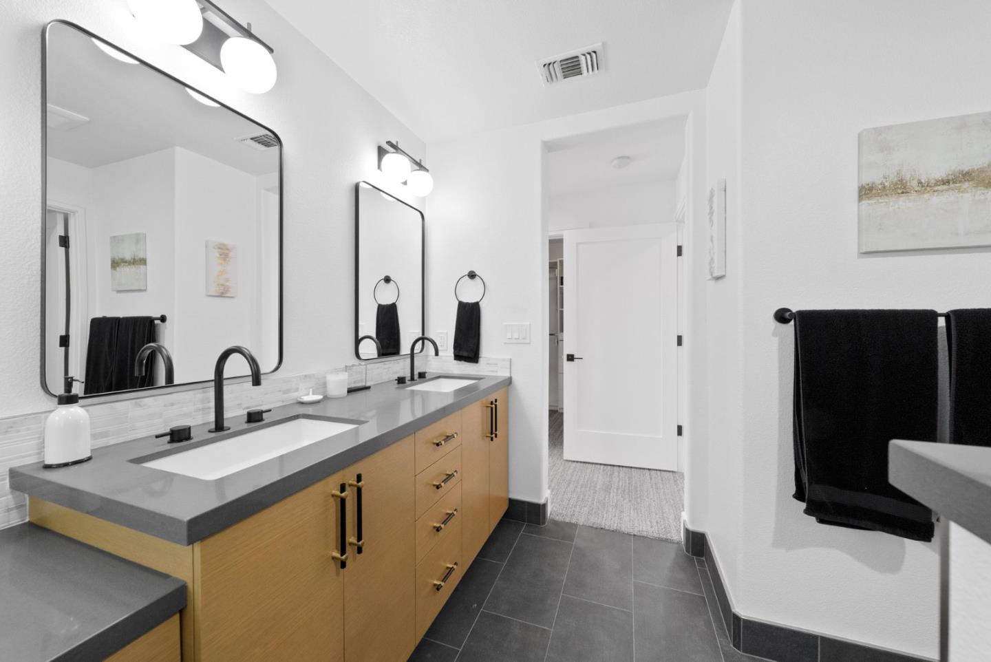 120 Harrison Avenue Campbell, CA 95008 - Photo 19 of 48 a bathroom with a double vanity sink and mirror