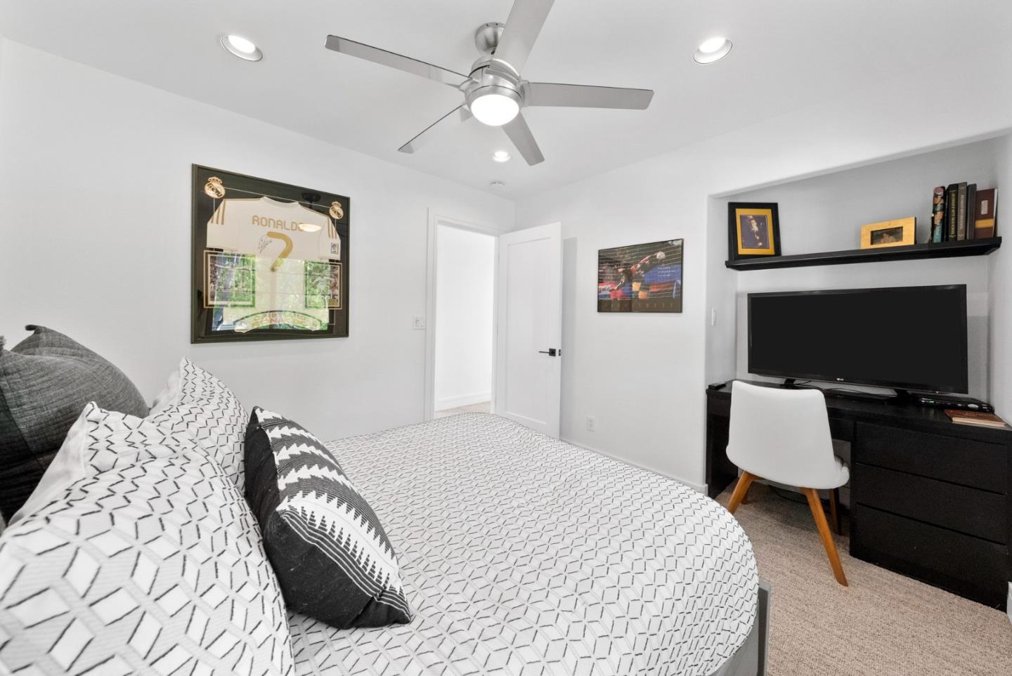 120 Harrison Avenue Campbell, CA 95008 - Photo 25 of 48 a bedroom with a bed and a flat screen tv