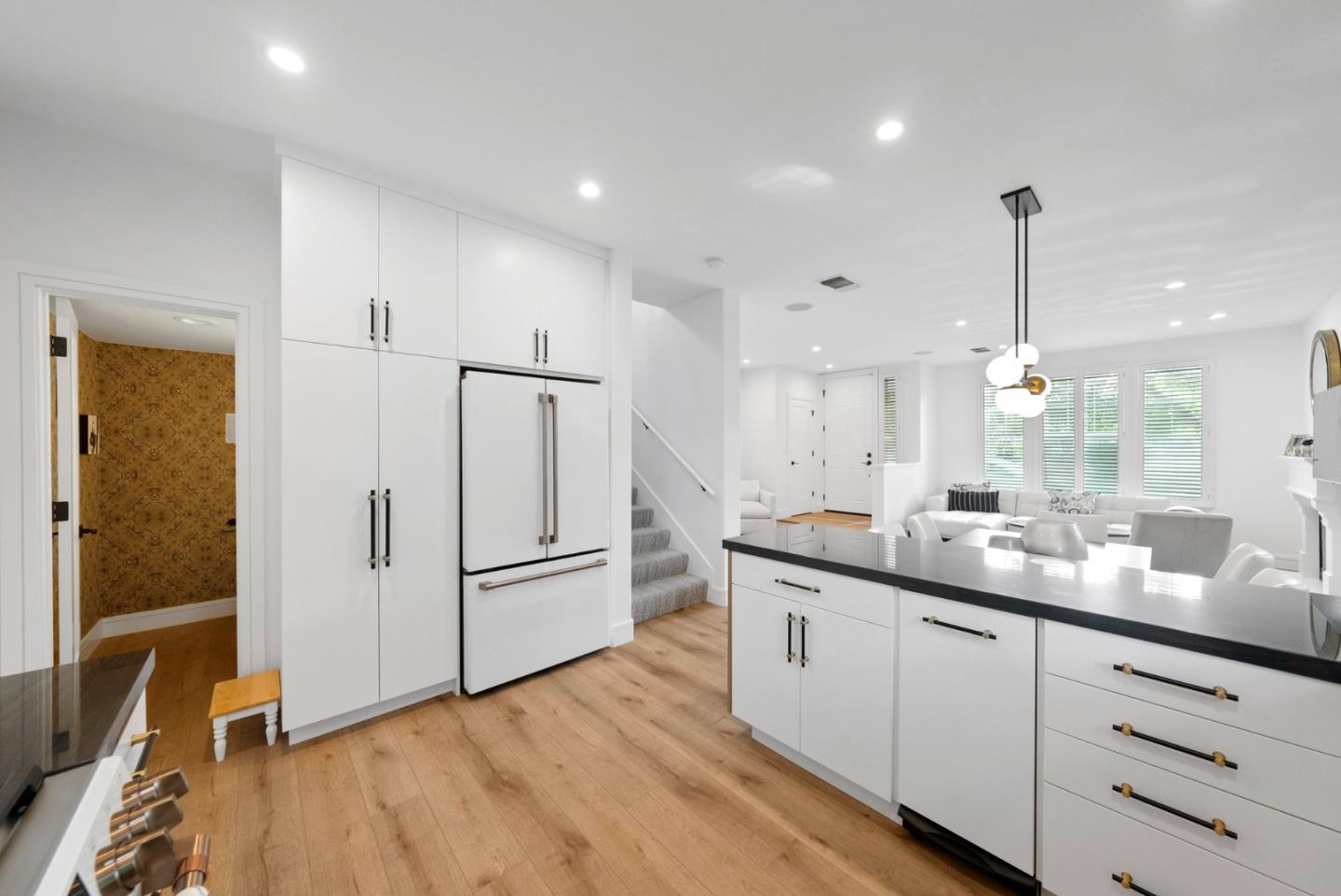 120 Harrison Avenue Campbell, CA 95008 - Photo 3 of 48 a kitchen with granite countertop a refrigerator a sink and white cabinets