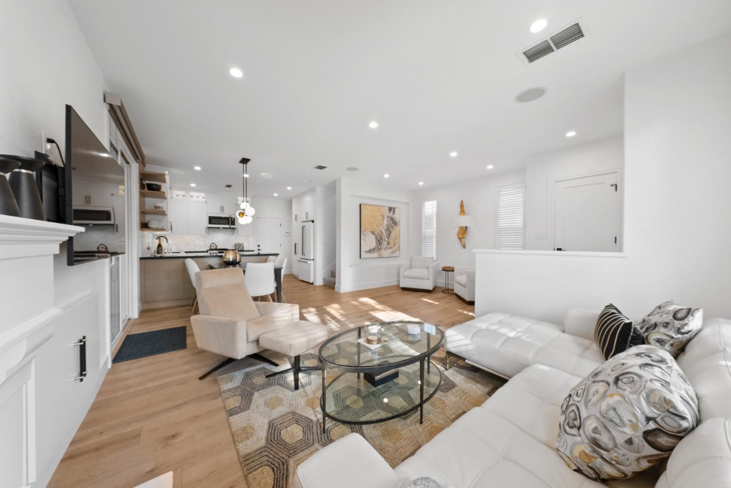 120 Harrison Avenue Campbell, CA 95008 - Photo 10 of 48 a large white kitchen with stainless steel appliances