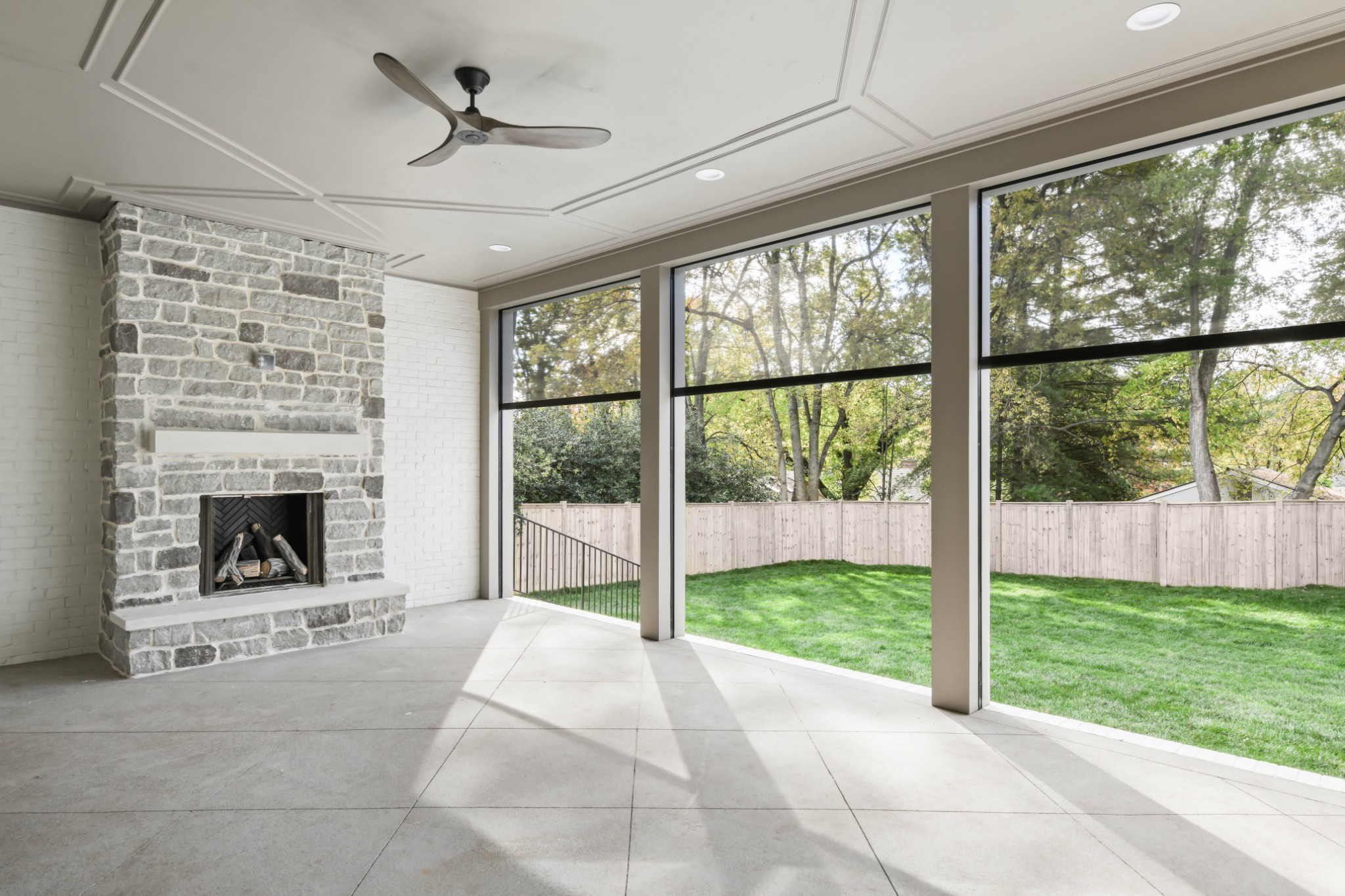 4001 Vailwood Drive Nashville, TN 37215 - Photo 12 of 25 a view of an empty room with a fireplace and a window