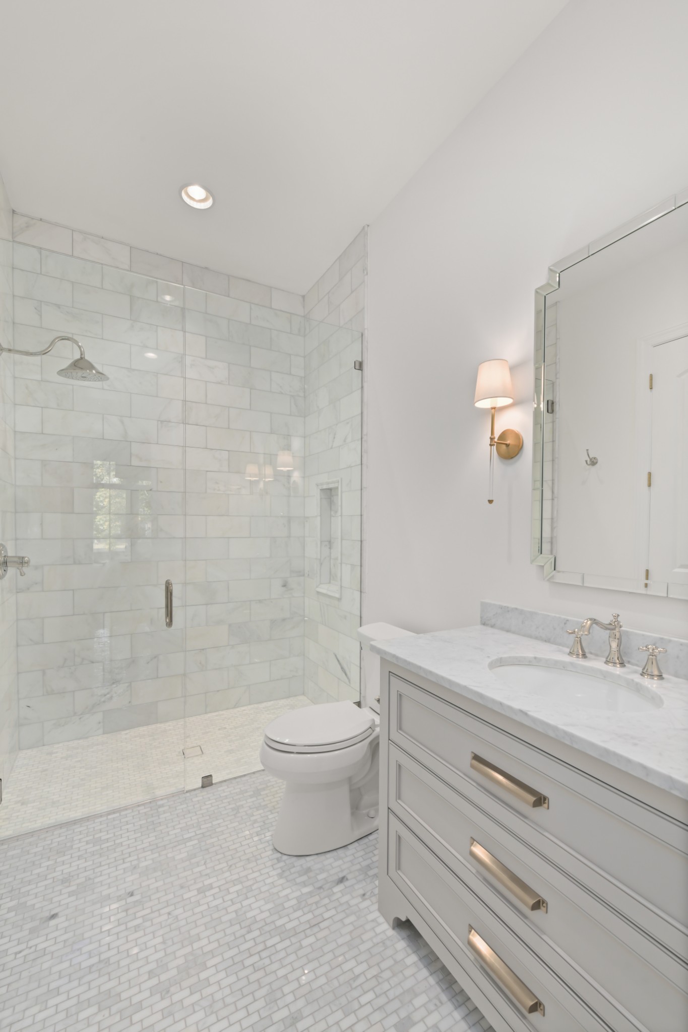 4001 Vailwood Drive Nashville, TN 37215 - Photo 17 of 25 a bathroom with a granite countertop sink a toilet and shower