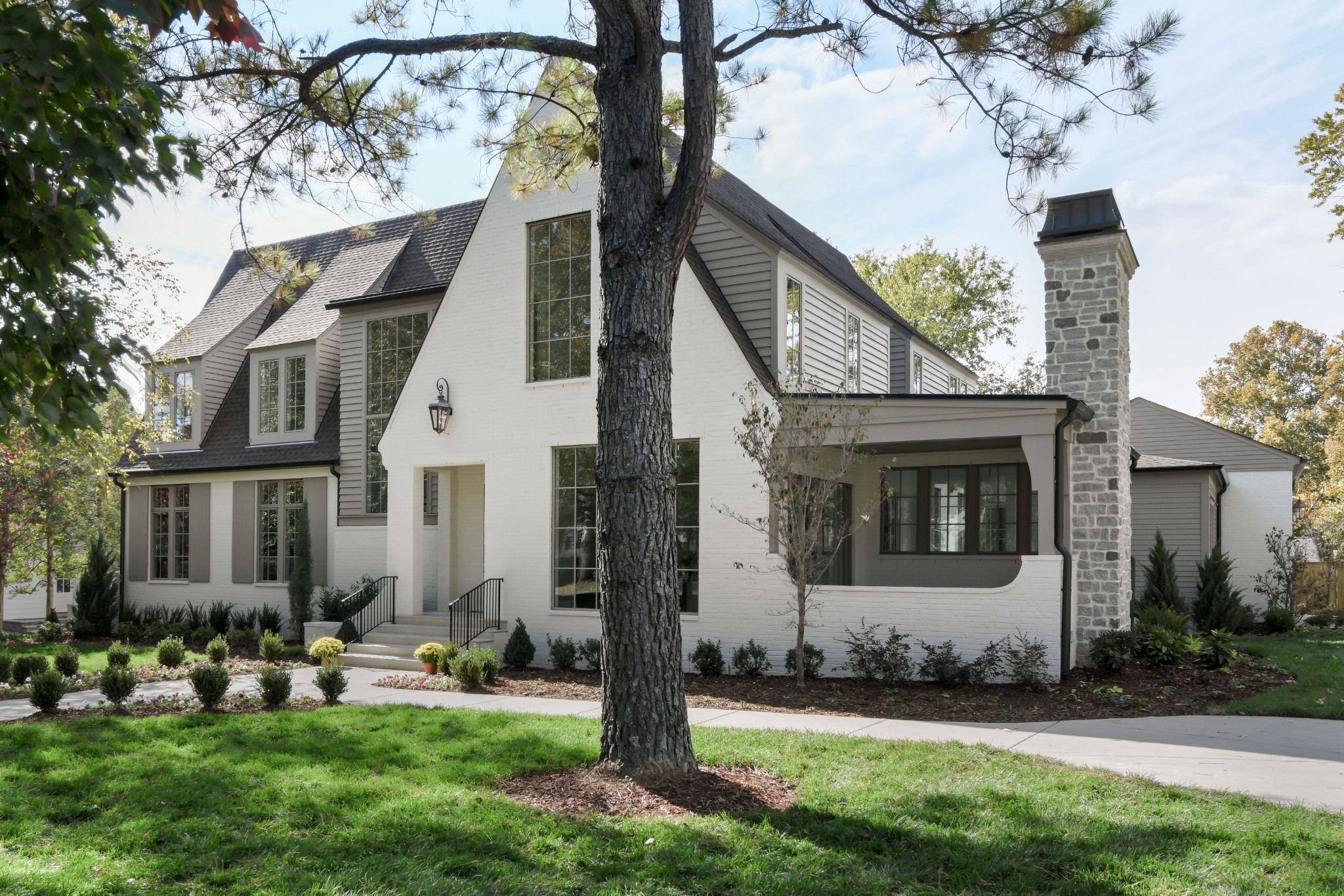 4001 Vailwood Drive Nashville, TN 37215 - Photo 22 of 25 a front view of a house with a yard and garage