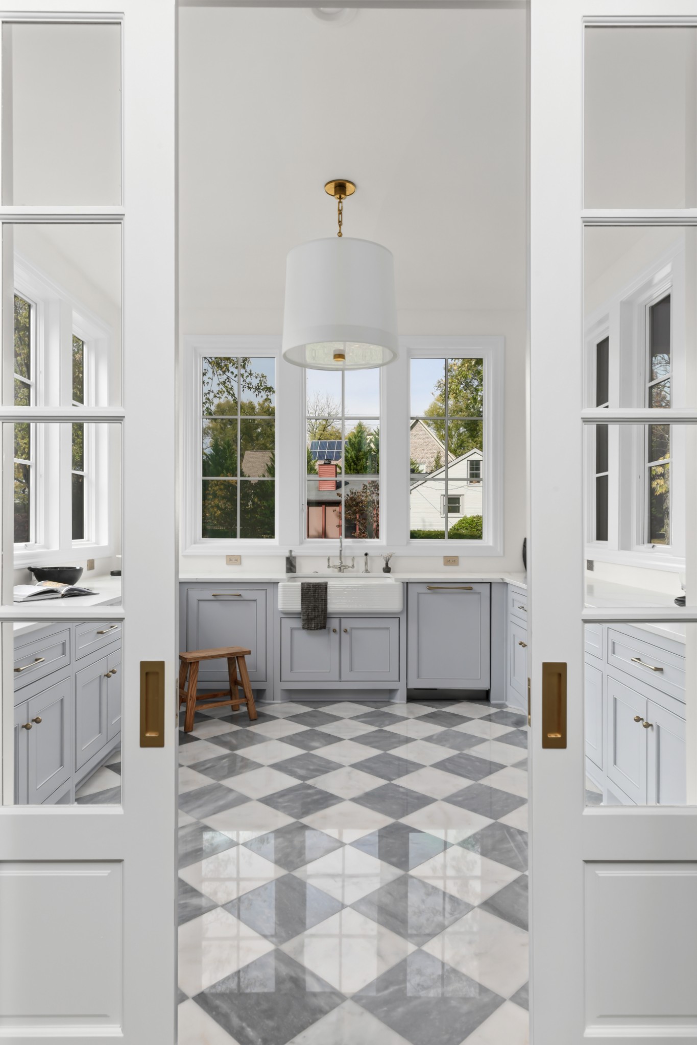 4001 Vailwood Drive Nashville, TN 37215 - Photo 3 of 25 a large white kitchen with granite countertop a sink white cabinets and a stove