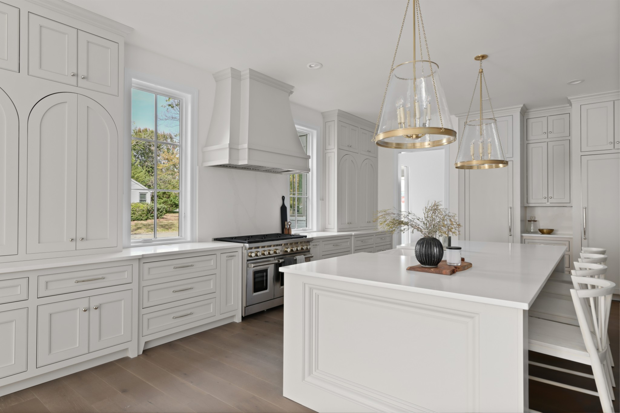 4001 Vailwood Drive Nashville, TN 37215 - Photo 7 of 25 a kitchen with stainless steel appliances granite countertop a stove a chimney a sink and cabinets
