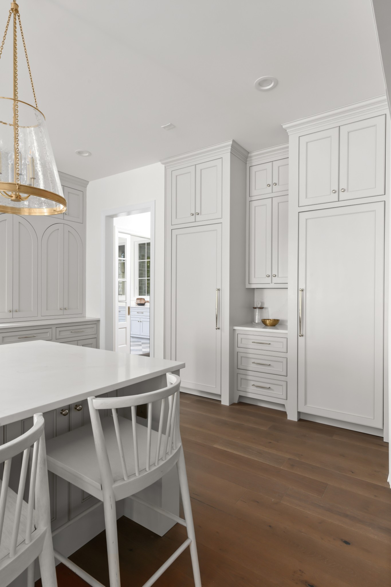 4001 Vailwood Drive Nashville, TN 37215 - Photo 8 of 25 a kitchen with white cabinets and wooden floor