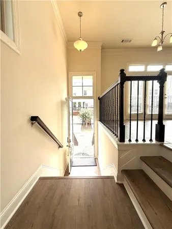 a view of a balcony with a floor to ceiling window