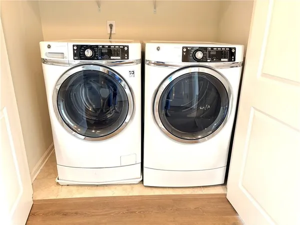 a utility room with dryer and washer