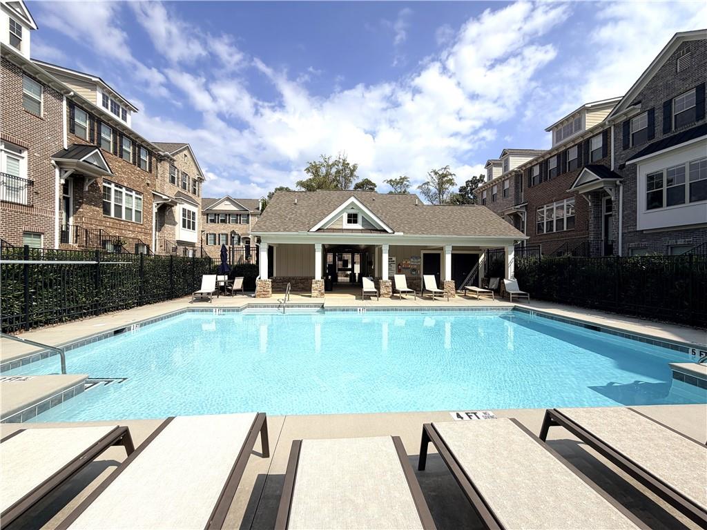 1980 Raven Way Chamblee, GA 30341 - Photo 46 of 51 a front view of a house with swimming pool