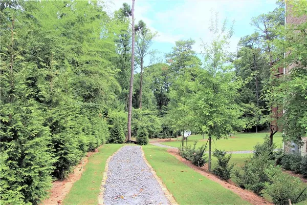 a view of a golf course with a park