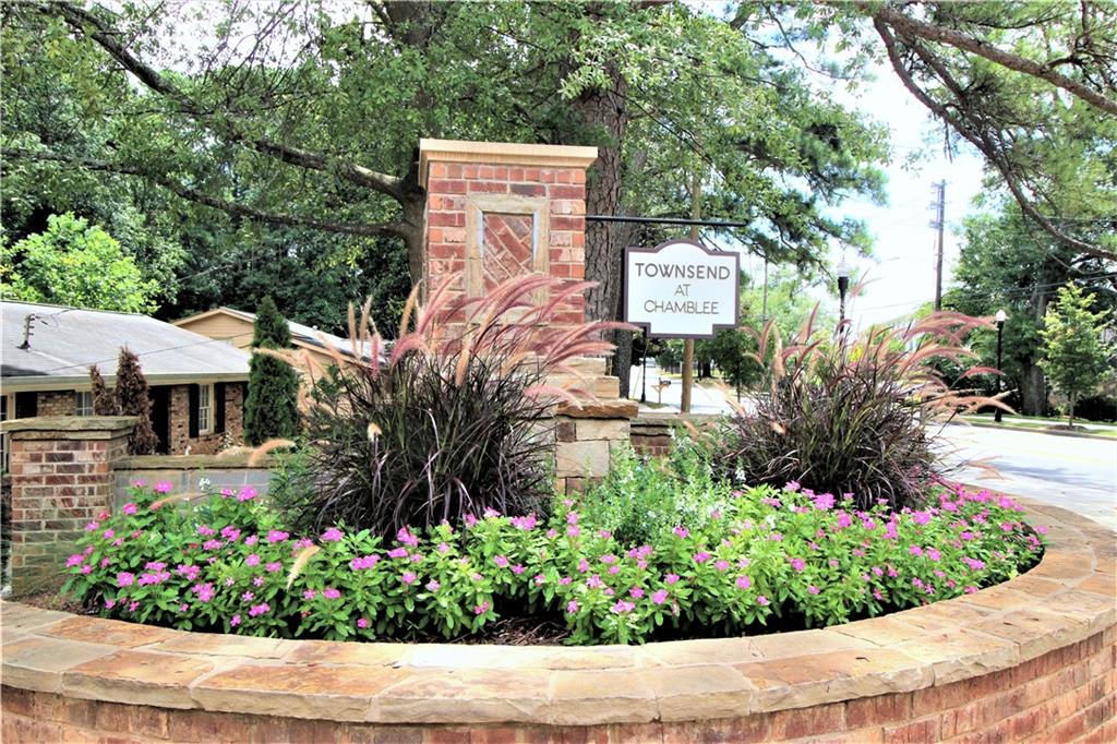 1980 Raven Way Chamblee, GA 30341 - Photo 51 of 51 a green field with flowers and trees