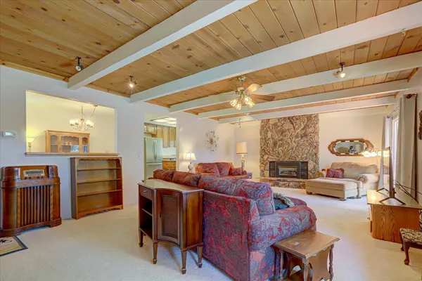 a living room with a couch and a fireplace