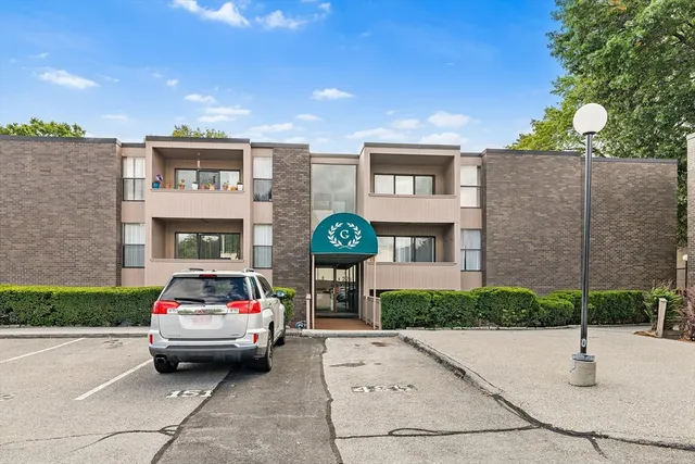 a car parked in front of a building