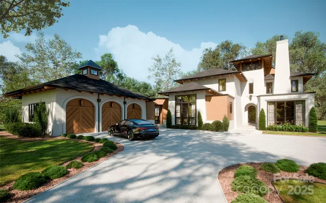 a front view of a house with a yard and outdoor seating