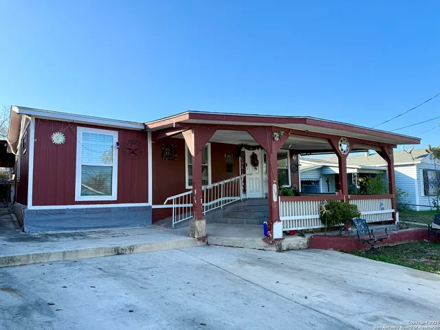 a view of house with outdoor space and porch