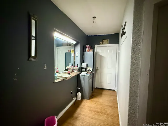 a view of a kitchen with a sink