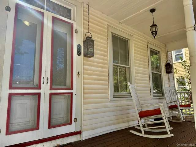 a backyard of a house with seating space