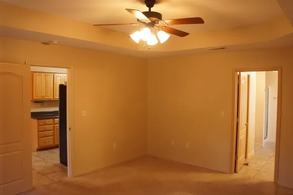 a view of empty room with windows