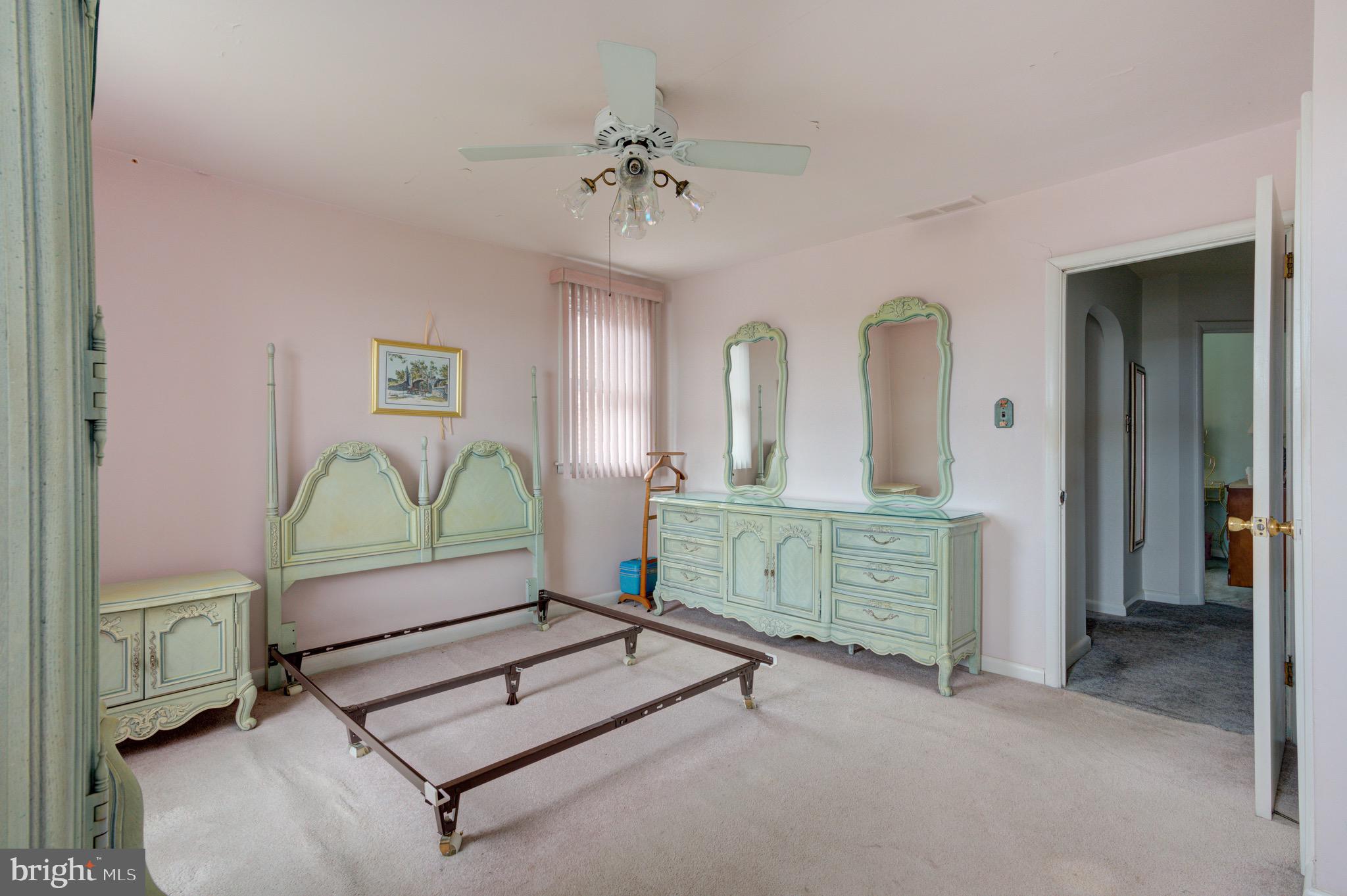 9075 Convent Avenue Philadelphia, PA 19136 - Photo 11 of 17 a living room with furniture and a chandelier