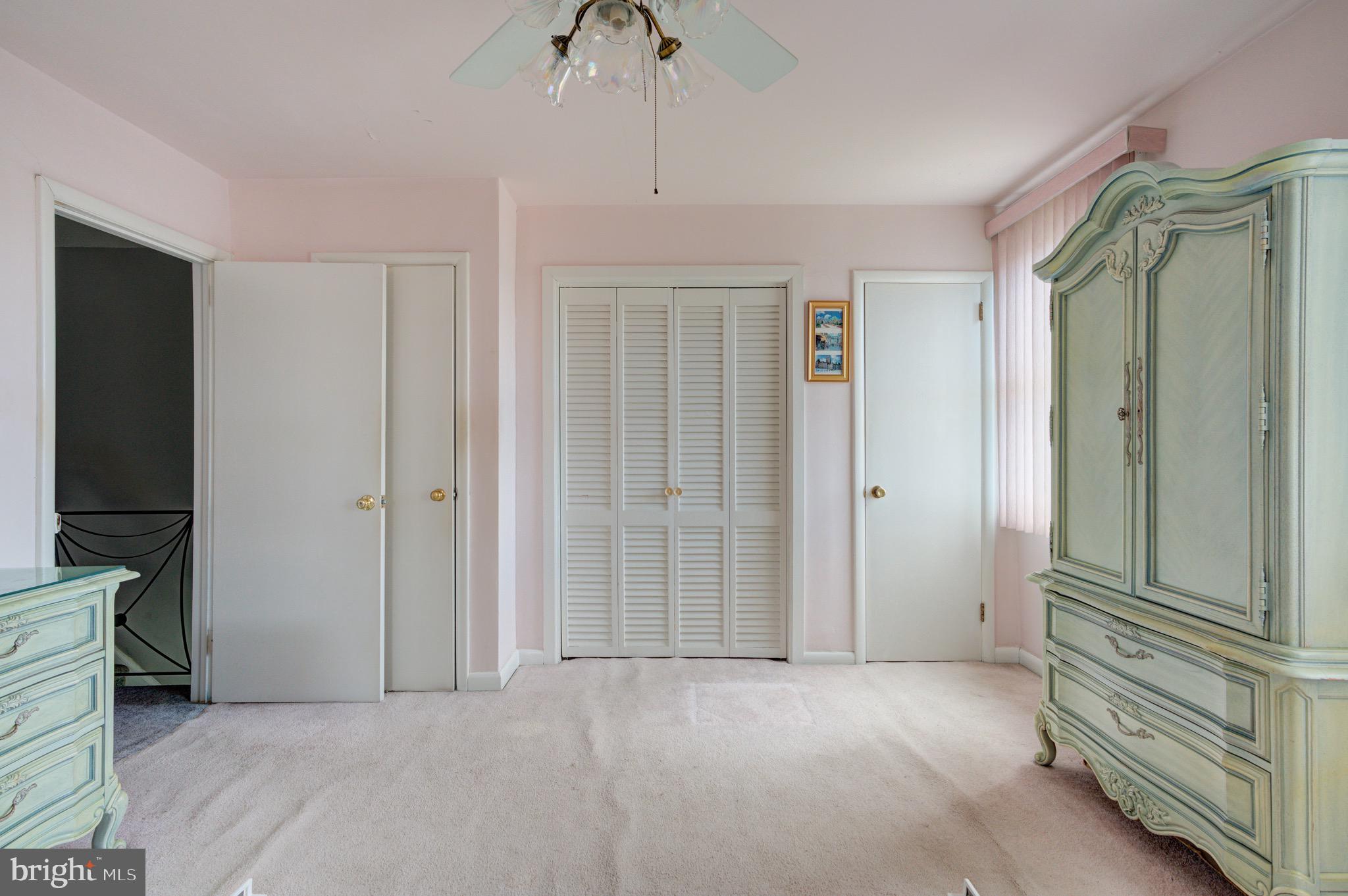 9075 Convent Avenue Philadelphia, PA 19136 - Photo 12 of 17 an empty room with closet and a chandelier fan