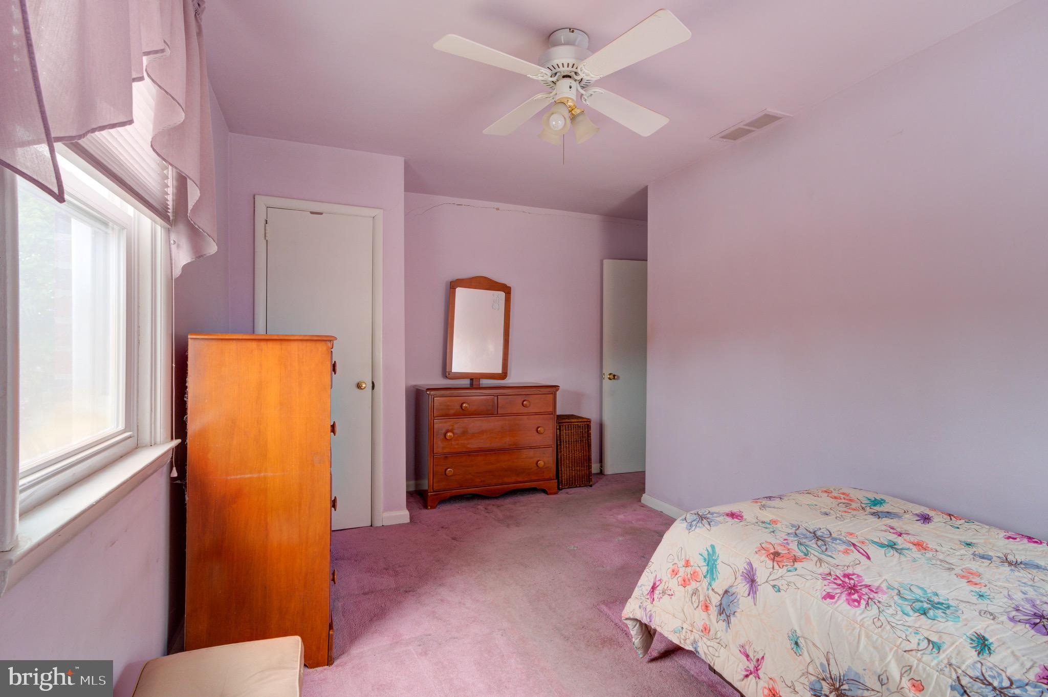 9075 Convent Avenue Philadelphia, PA 19136 - Photo 5 of 17 a bedroom with a bed and a dresser