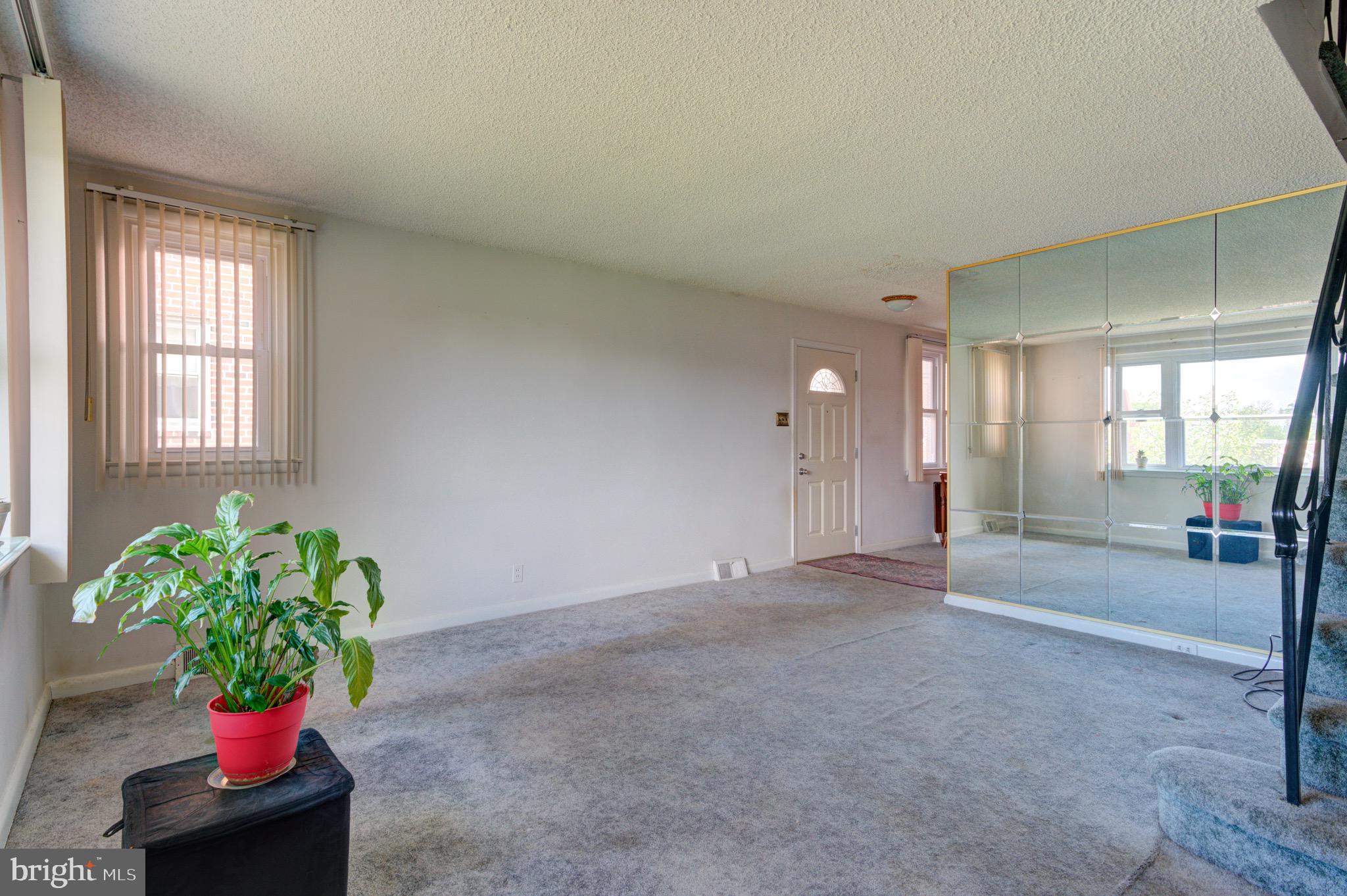 9075 Convent Avenue Philadelphia, PA 19136 - Photo 9 of 17 a view of an empty room and a window
