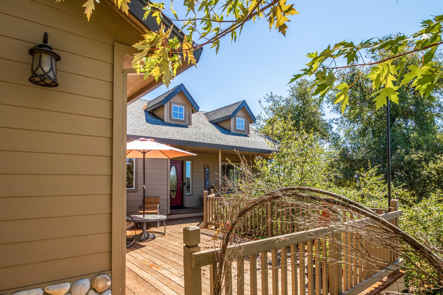 9290 Cramer Road Auburn, CA 95602 - Photo 5 of 67 a view of a house with a patio