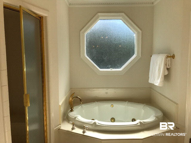 401 Potters Mills Road Daphne, AL 36526 - Photo 17 of 28 For Sale: 401 Potters Mill Avenue, Daphne, AL 36526 Master Bathroom with jacuzzi tub, shower, sep. toilet area