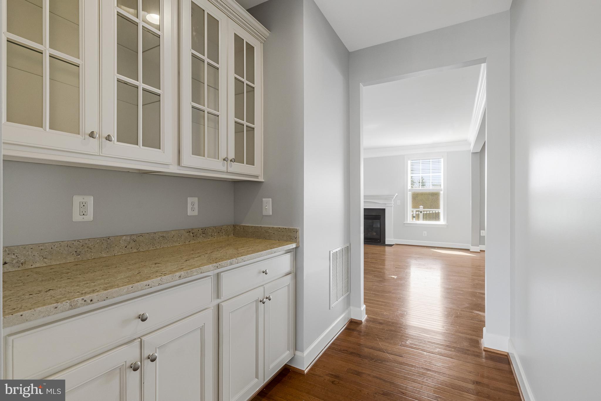 41729 Wakehurst Place Leesburg, VA 20176 - Photo 14 of 71 a view of a kitchen with wooden floor and a sink