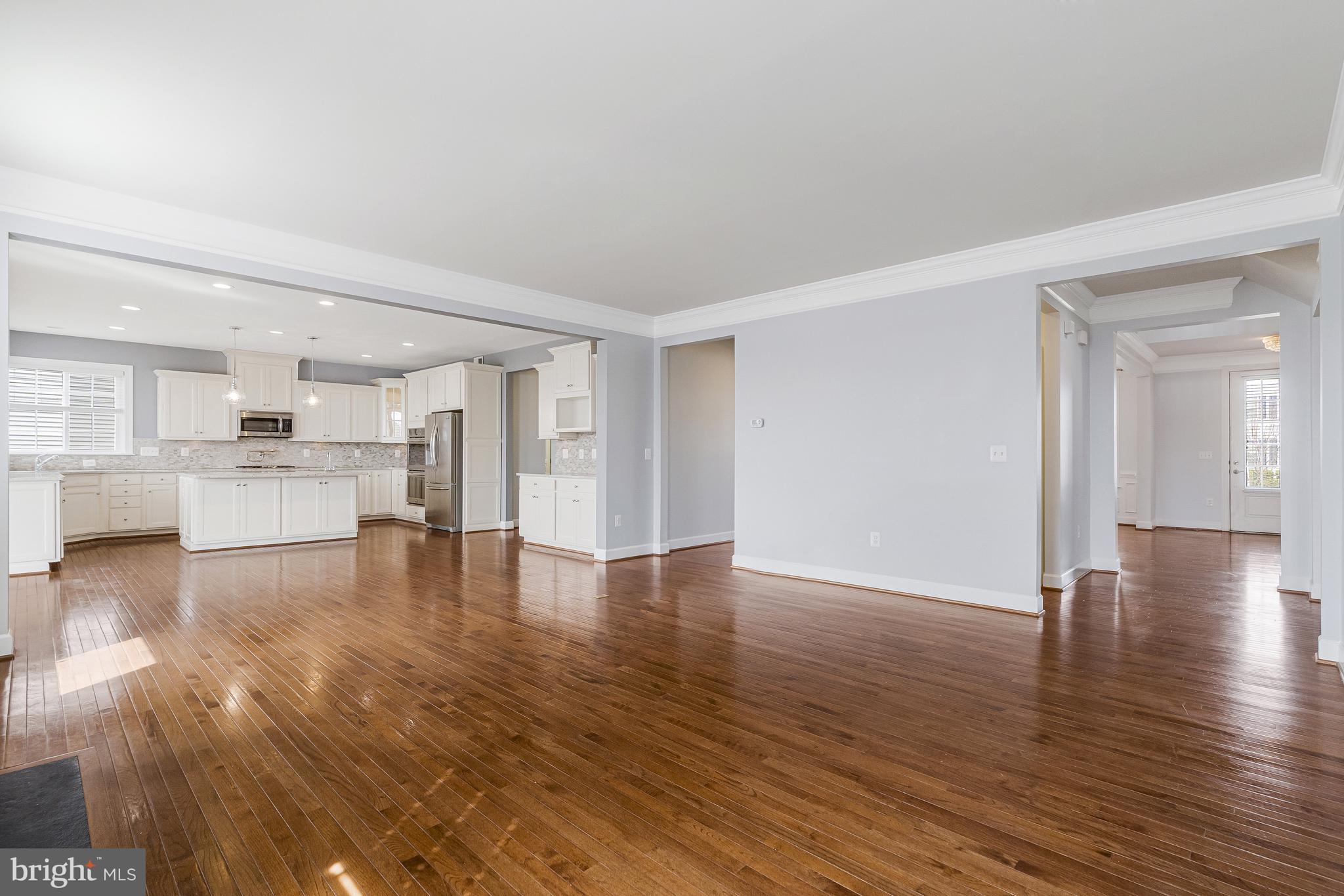 41729 Wakehurst Place Leesburg, VA 20176 - Photo 18 of 71 a view of a kitchen with wooden floor and a kitchen