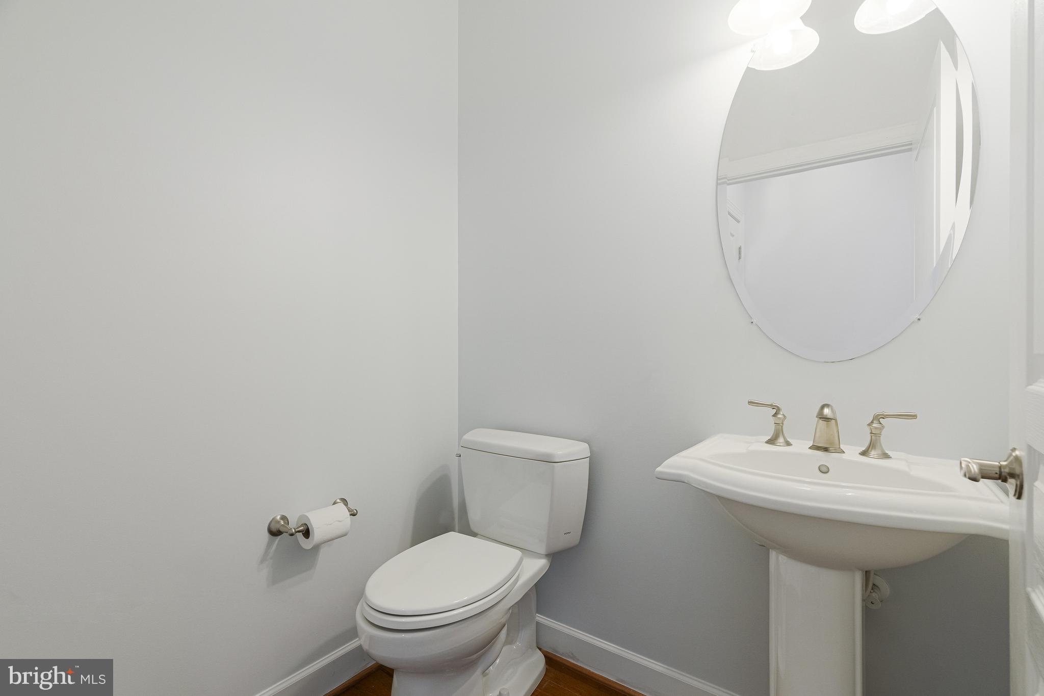 41729 Wakehurst Place Leesburg, VA 20176 - Photo 31 of 71 a bathroom with a sink and a toilet