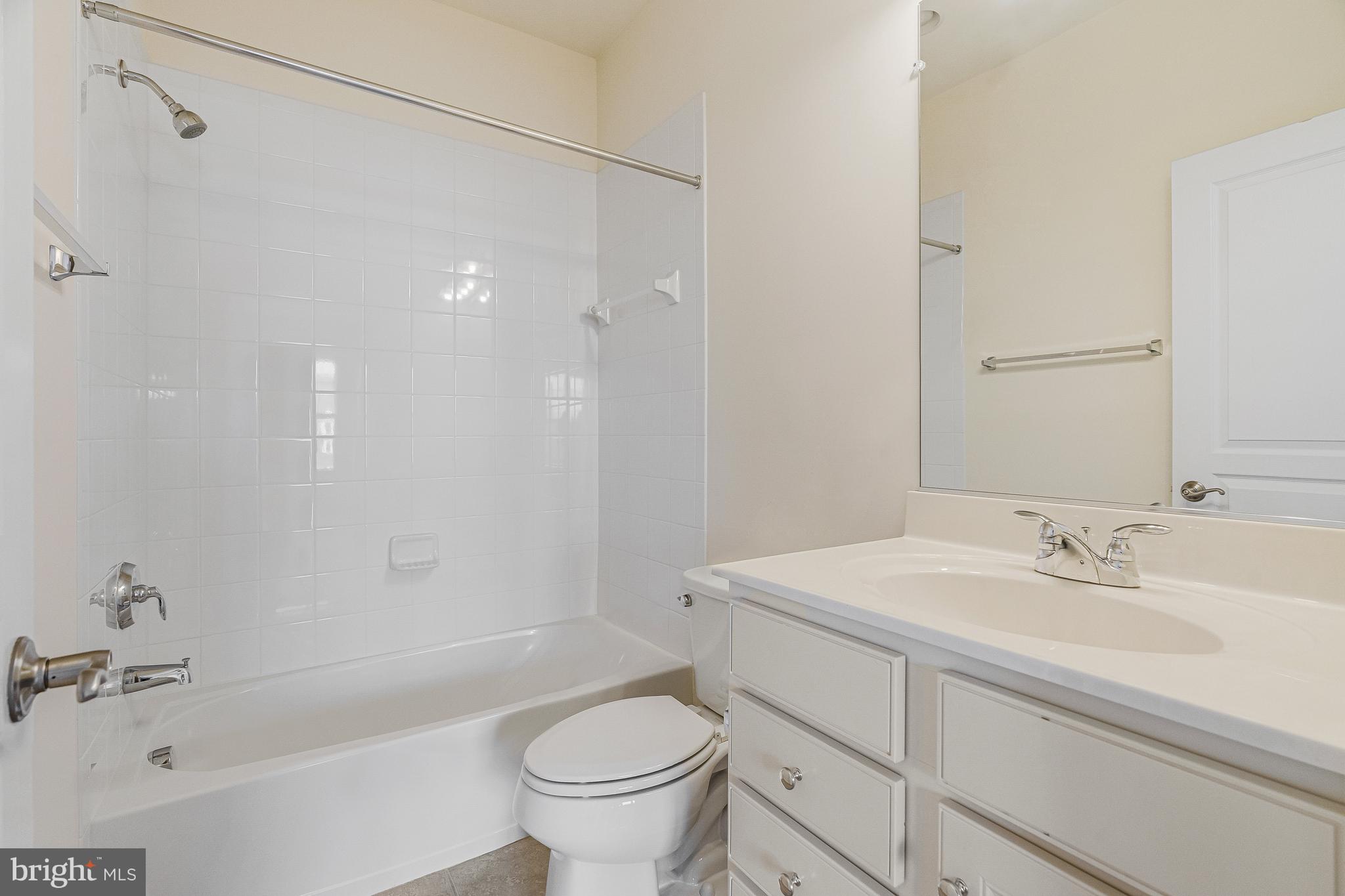 41729 Wakehurst Place Leesburg, VA 20176 - Photo 45 of 71 a bathroom with a sink a toilet and shower