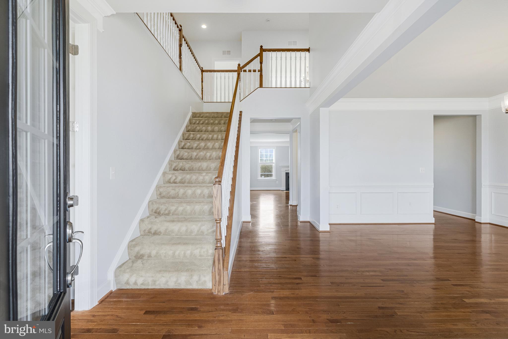 41729 Wakehurst Place Leesburg, VA 20176 - Photo 5 of 71 a view of an entryway with wooden floor