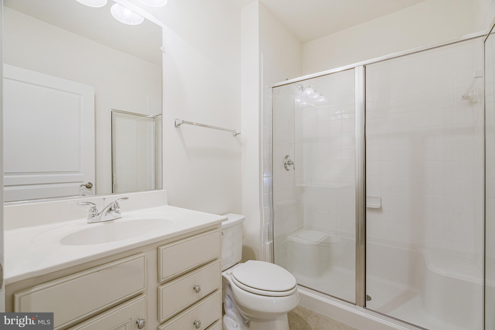 41729 Wakehurst Place Leesburg, VA 20176 - Photo 59 of 71 a bathroom with a sink toilet and shower