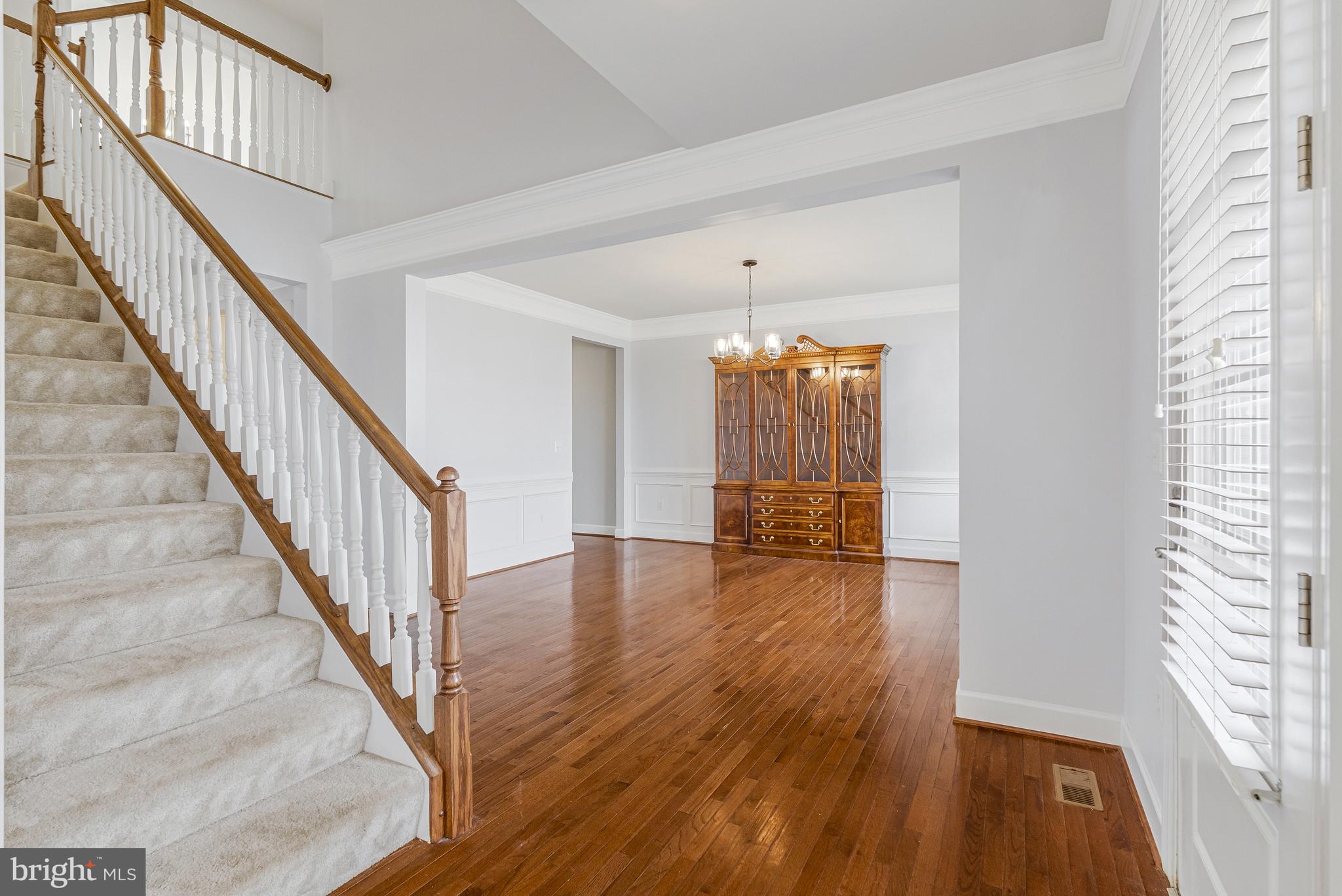 41729 Wakehurst Place Leesburg, VA 20176 - Photo 9 of 71 a view of an entryway with wooden floor