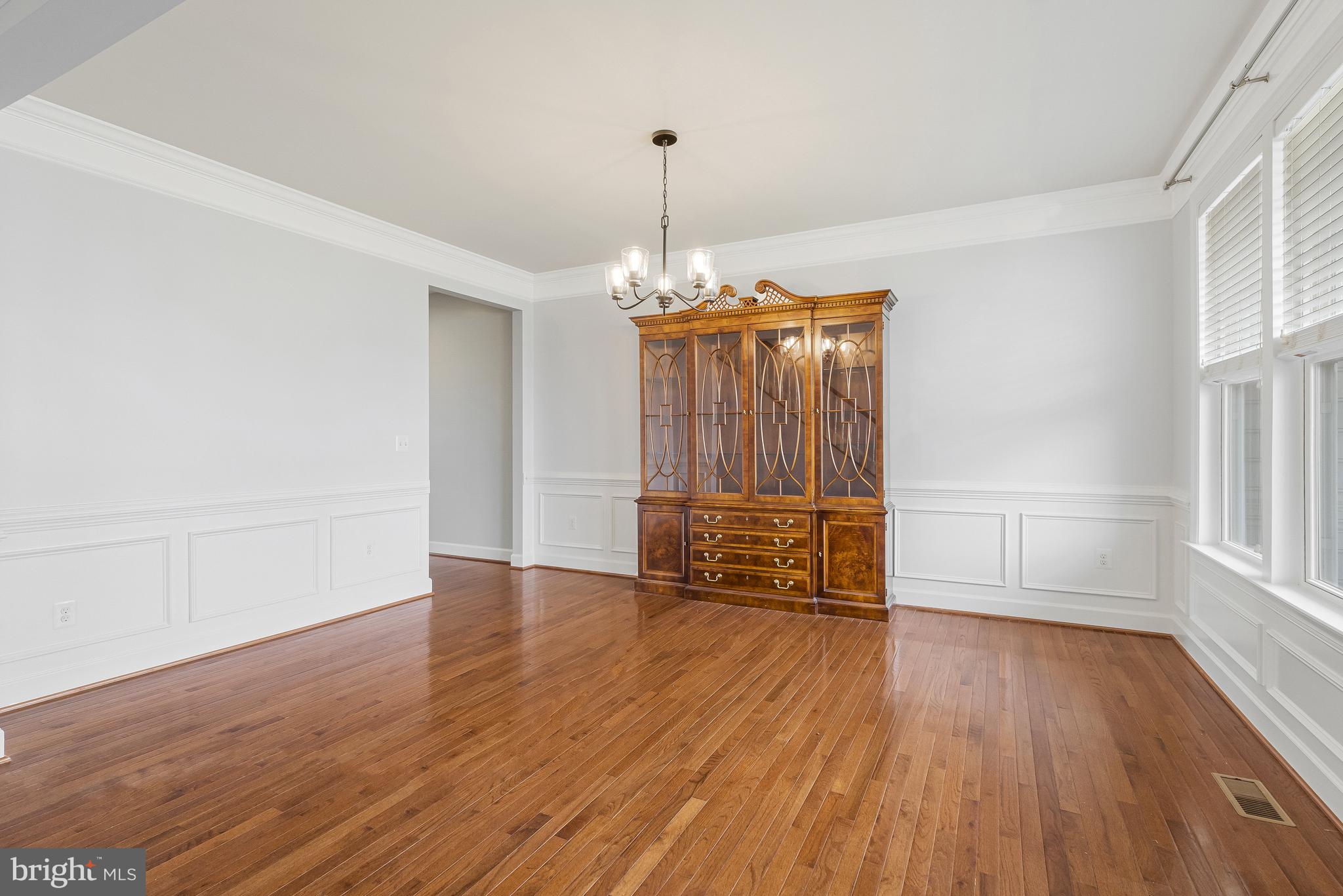 41729 Wakehurst Place Leesburg, VA 20176 - Photo 10 of 71 wooden floor in an empty room with a window