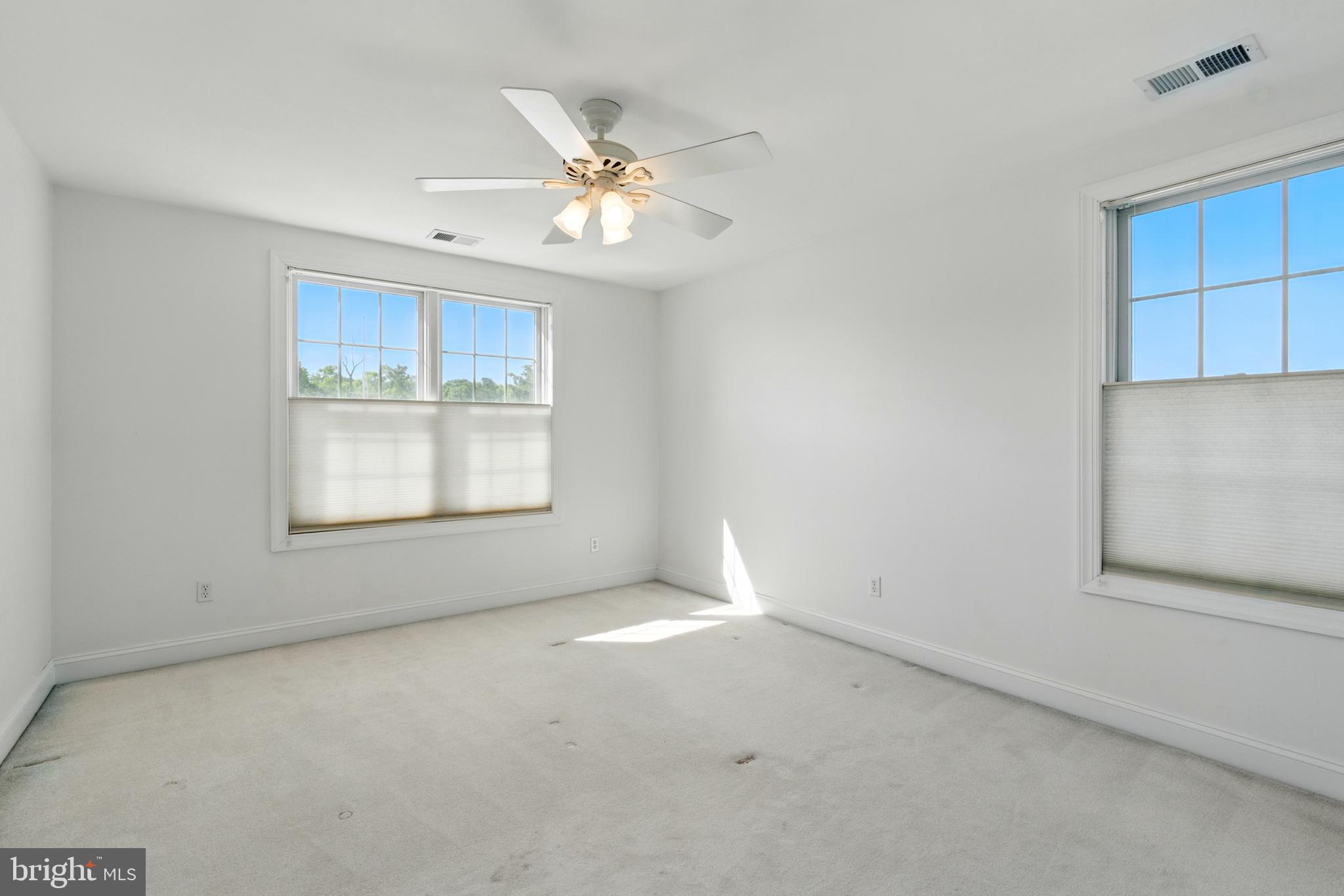 6119 New Street, Unit 2 Rock Hall, MD 21661 - Photo 26 of 44 a view of an empty room with a window