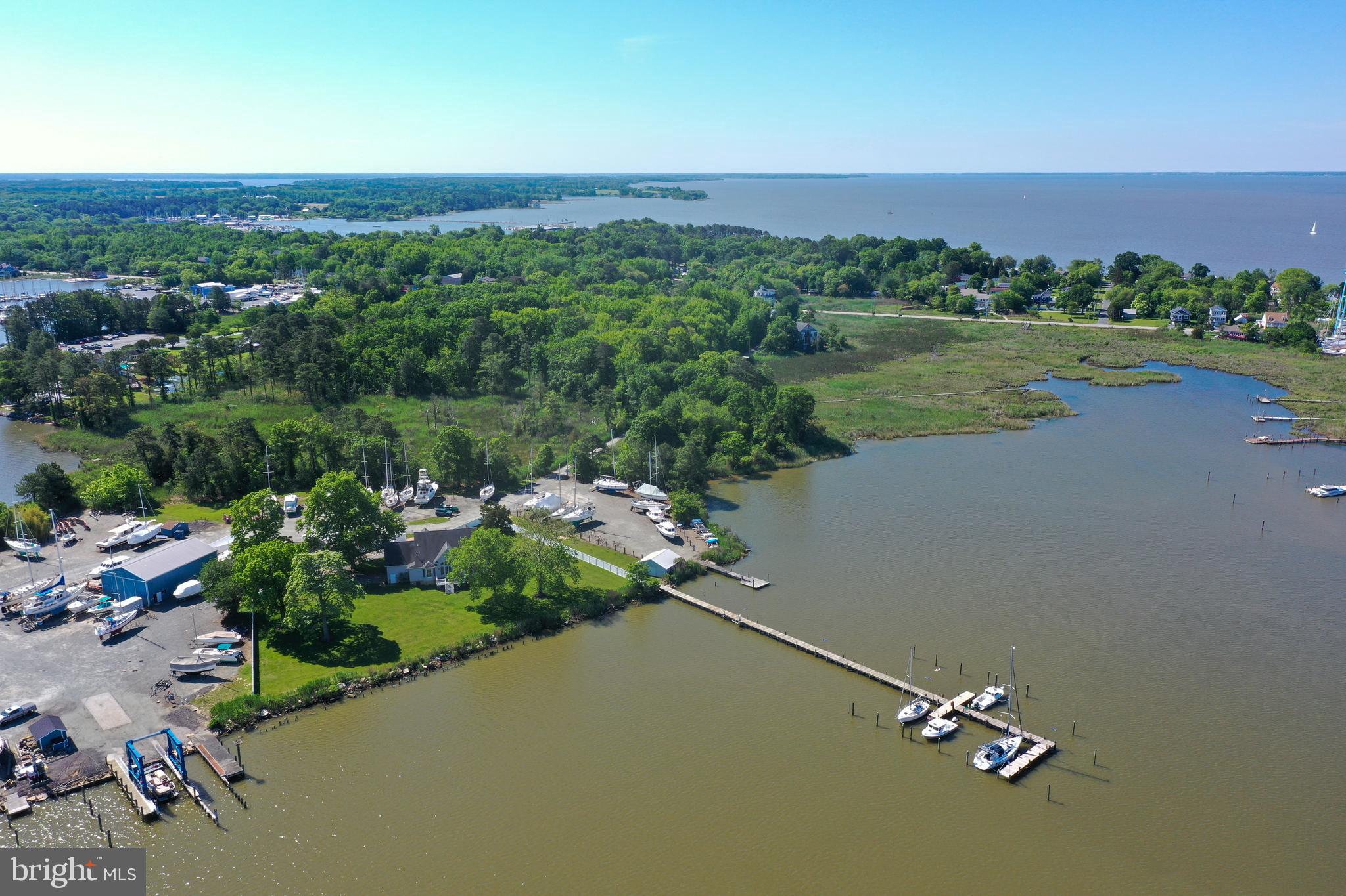 6119 New Street, Unit 2 Rock Hall, MD 21661 - Photo 43 of 44 a view of a lake with a city