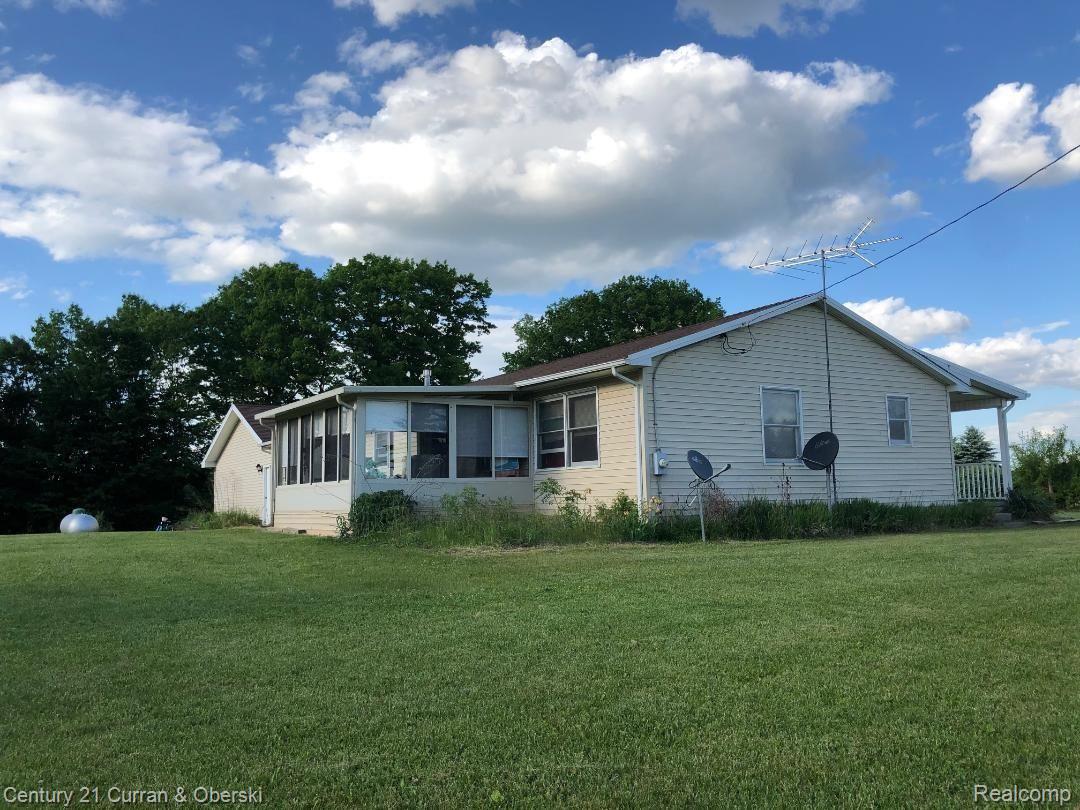2150 Gavord Road Sterling, MI 48659 - Photo 19 of 29 sun room from outside.jpg