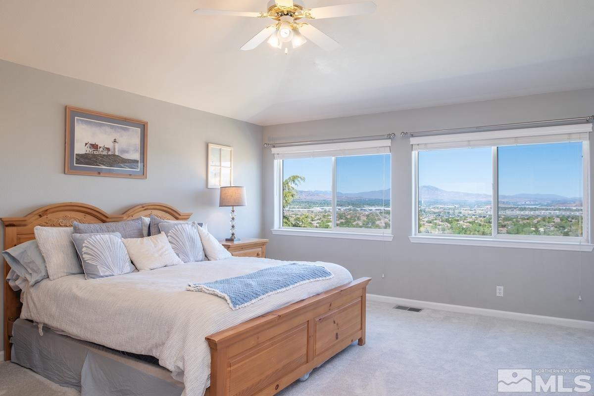 1415 Sioux Trail Reno, NV 89521 - Photo 16 of 40 a bedroom with bed and a window