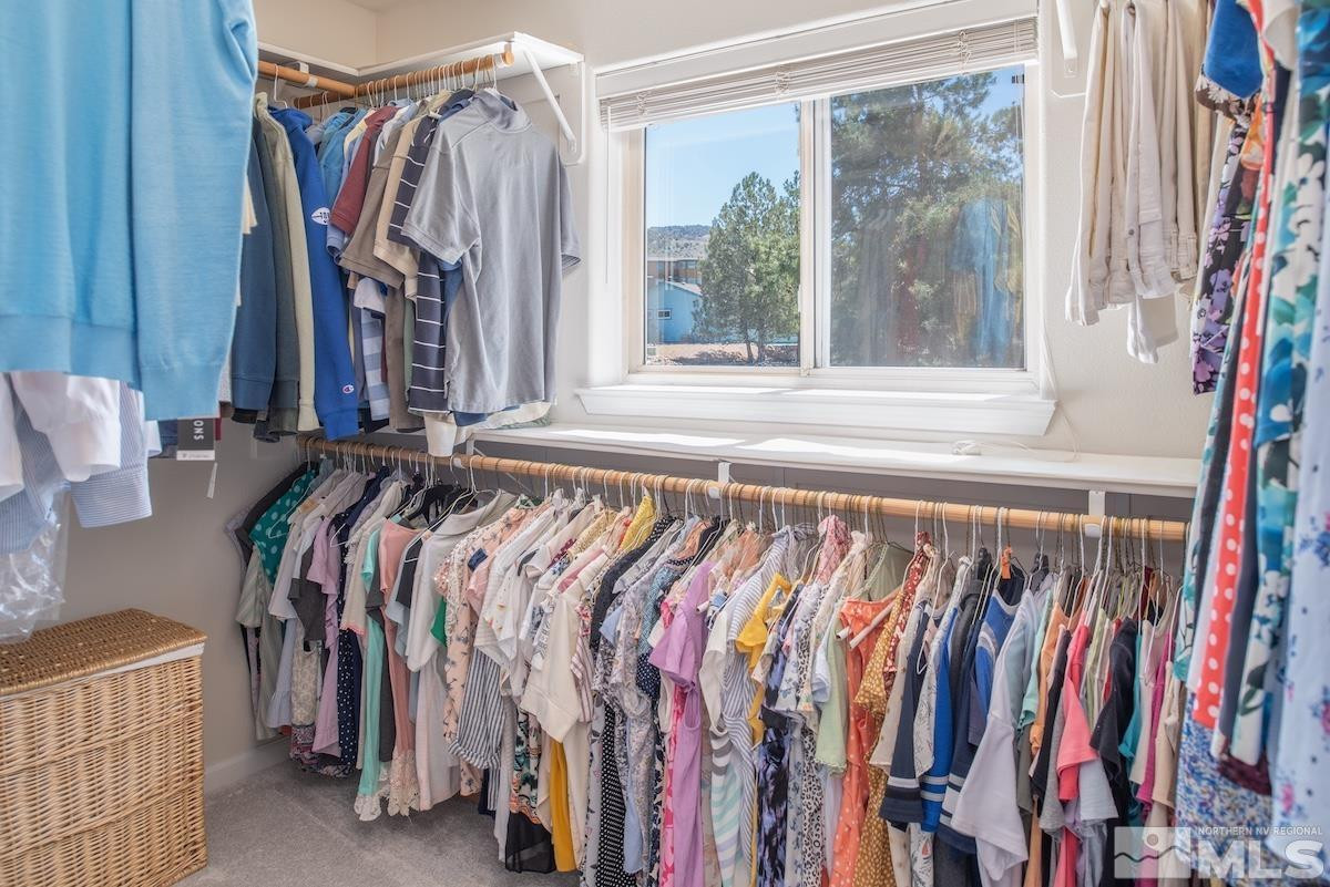 1415 Sioux Trail Reno, NV 89521 - Photo 21 of 40 a view of walk in closet with clothes
