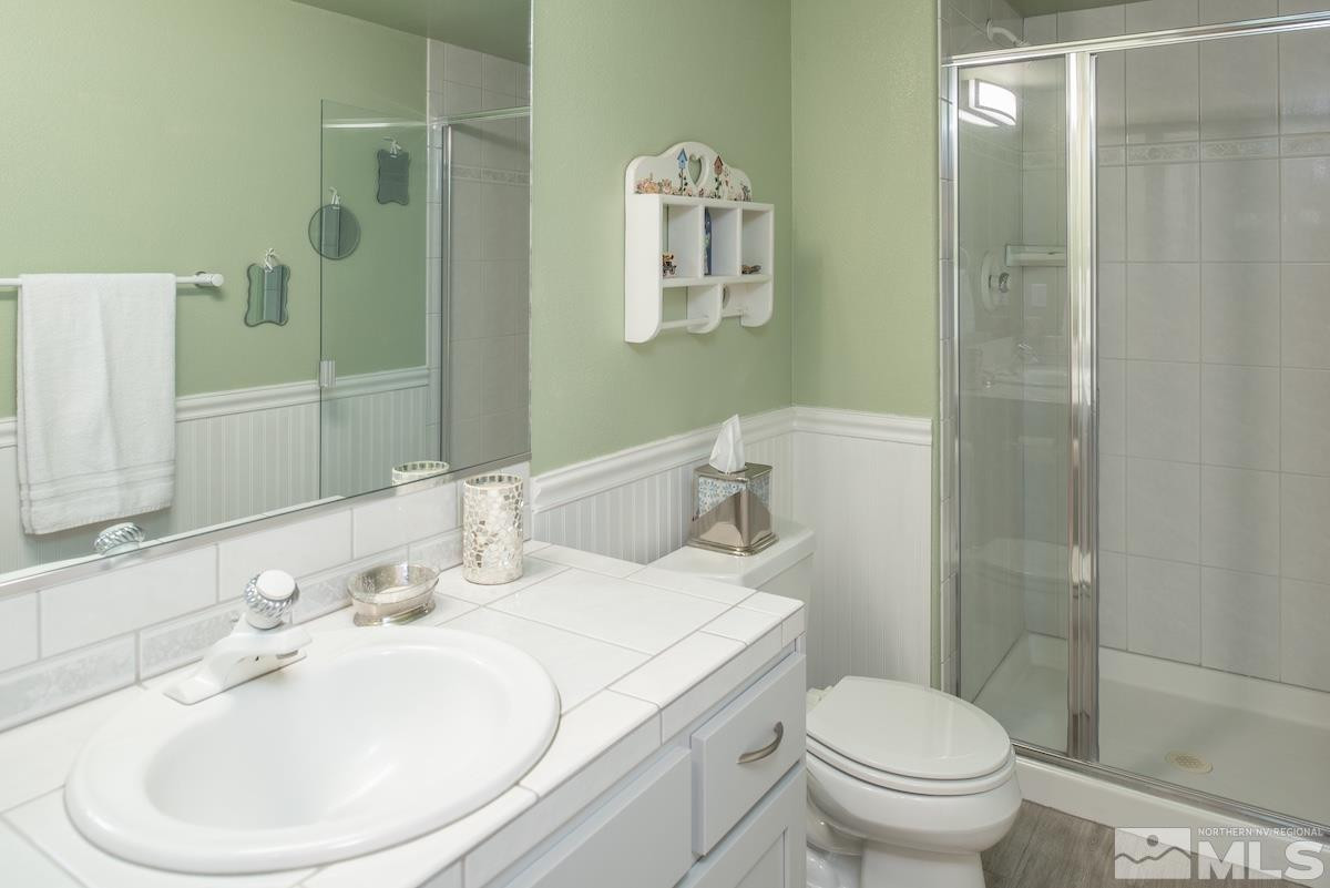 1415 Sioux Trail Reno, NV 89521 - Photo 31 of 40 a bathroom with a sink toilet and shower
