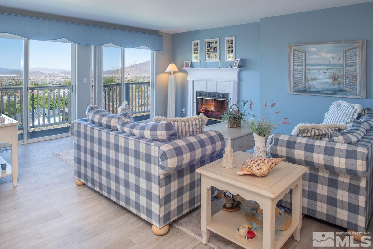 1415 Sioux Trail Reno, NV 89521 - Photo 8 of 40 a living room with furniture and a fireplace