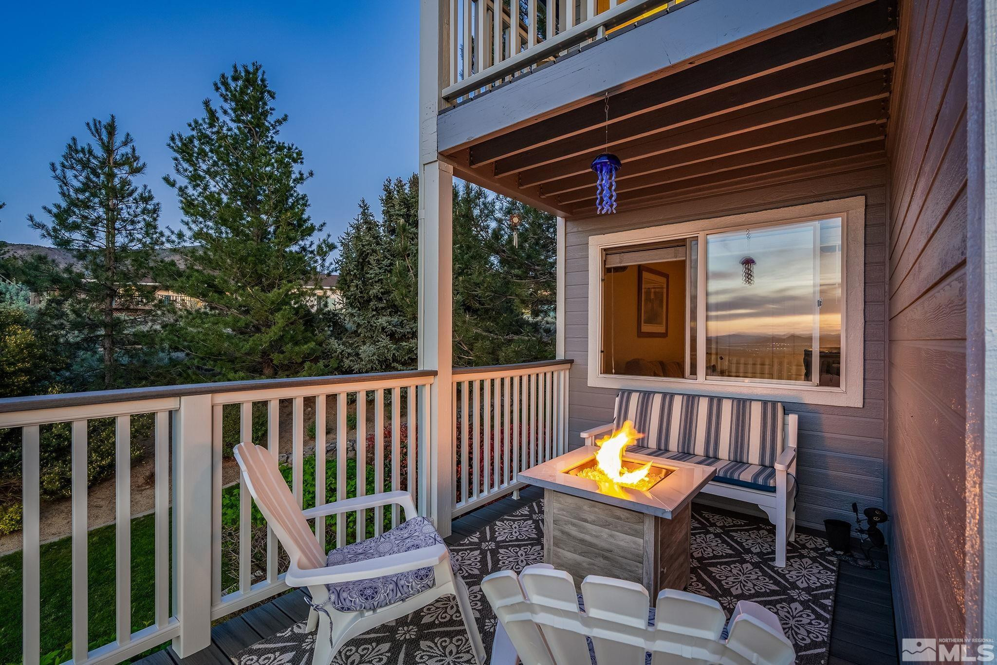 1415 Sioux Trail Reno, NV 89521 - Photo 9 of 40 a view of a chair and tables in the balcony