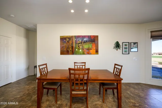 a view of a dining room with furniture